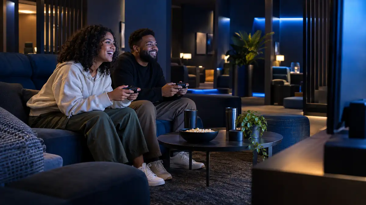 Friends enjoying a console session in a gaming lounge